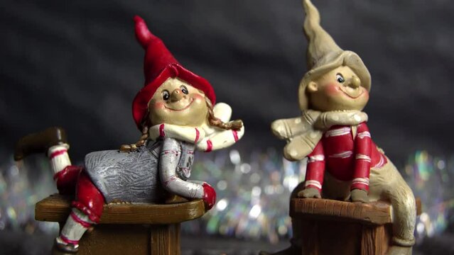 Christmas composition. Gnomes are sledding. 