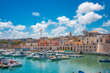 View of seafront and old town Bisceglie in Puglia on summer. - obrazy, fototapety, plakaty
