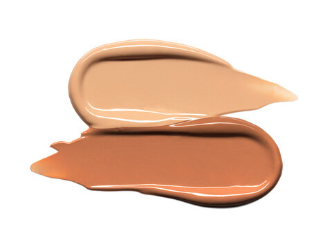 Makeup Liquid foundation smear composition isolated on white background. BB CC Cream Concealer texture. Cosmetic product brush swatch