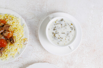Azerbaijan traditional cuisine dovga, cooked from yoghurt and greens.