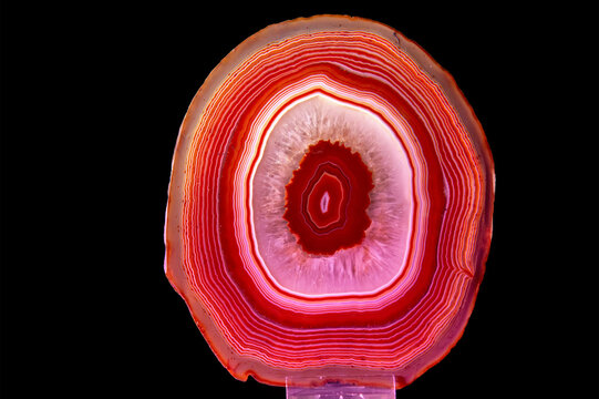 Red agate mineral on the black background