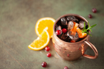 Cranberry Orange Moscow mule, holiday drink in a copper mug. - obrazy, fototapety, plakaty