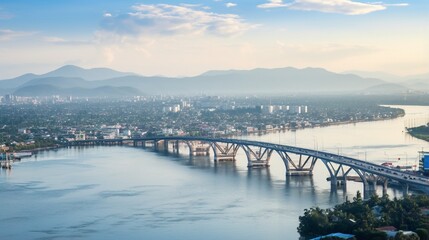Obraz premium Traffic in Tien Giang, Vietnam The 2,691-meter-long My Loi bridge over the Mekong River in the morning connects Long An and Tien Giang provinces to economic growth in Tien Giang, Vietnam.