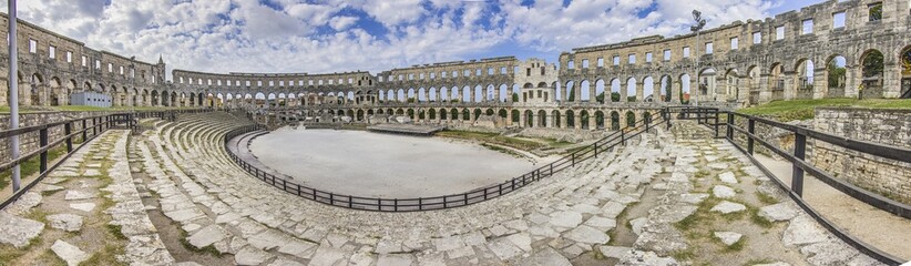 View inside the Roman amphitheater in the Croatian city of Pula without people - obrazy, fototapety, plakaty