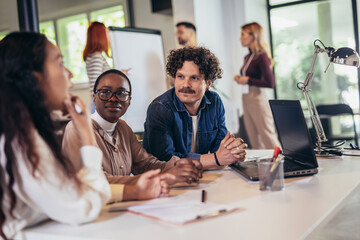Group of multiethnic business people working together in the office