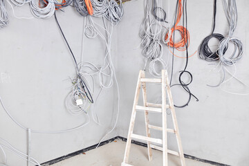 Bunch of electrical wires ready for installing on a construction site.
