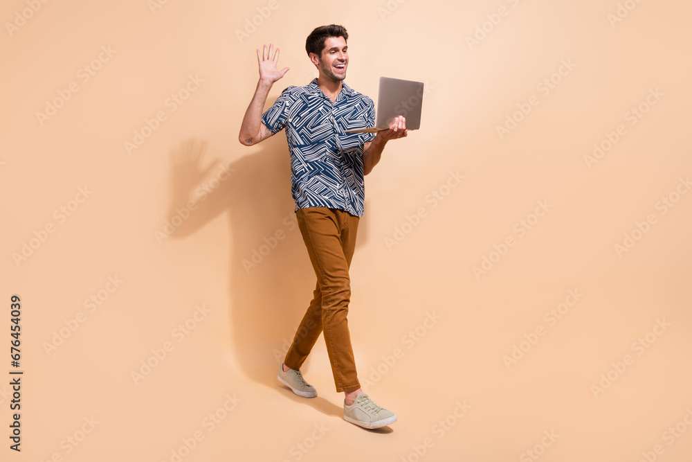 Aufkleber full body size photo of young programmer guy on online meeting while spending vacation in resort iso