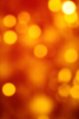 Red Christmas Background with golden Bokeh   lights. Xmas defocused wallpaper