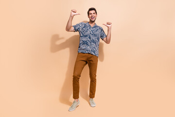 Full length photo of excited guy casual summer outfit pointing fingers himself the best sales manager isolated on beige color background