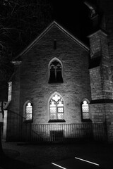 Vertical shot of a beautiful church during the dark night