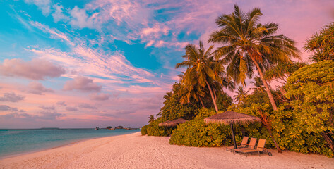 Island paradise palm tree sea sand beach. Panoramic amazing landscape. Inspire tropical beach seascape horizon. Colorful sunset sky calm tranquil relax summer mood. Vacation destination travel coast