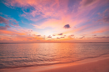 Beautiful sunset horizon sea or ocean. Vibrant soft colors magic sunlight. Small clouds yellow...