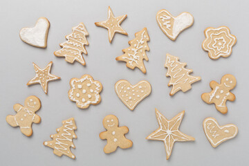 Cute homemade Christmas cookies on color background,top view