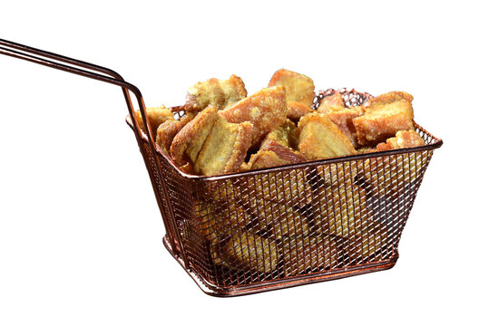delicious fried pork rinds, typical Brazilian food served in a metal basket