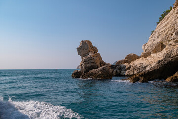 view from the boat of the famous rock caves of the Gargano coast