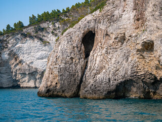 view from the boat of the famous rock caves of the Gargano coast