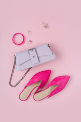 Handbag with pink shoes and jewelry. Women's stylish and elegant accessories. Fashion spring or autumn outfit. Flat lay, top view, overhead.