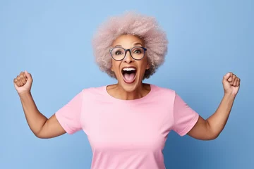 Photo sur Aluminium Vielles portes Elderly overjoyed excited fun cool African American woman 50s years old she wears pink undershirt casual clothes look camera spread hands isolated on plain pastel light blue background studio