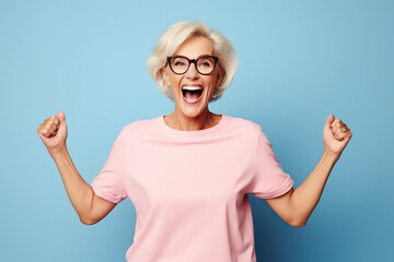 Elderly overjoyed excited fun cool woman 50s years old she wears pink undershirt casual clothes...
