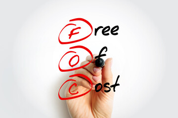 FOC - Free Of Cost acronym with marker, business concept background