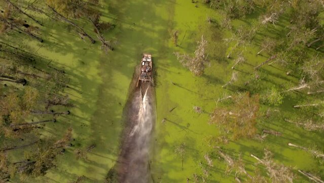 Aerial Top Forward Shot Of Airboat Moving On Atchafalaya River - Bayou, Louisiana