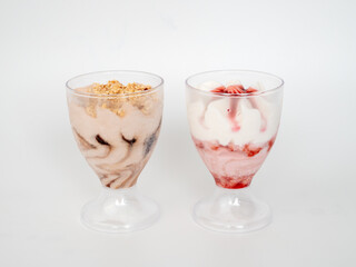 Ice cream on a white background. Ice cream in a plastic cup on a white background.
