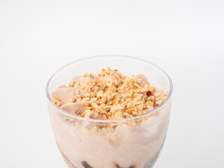 Ice cream on a white background. Ice cream in a plastic cup on a white background.