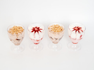 Ice cream on a white background. Ice cream in a plastic cup on a white background.