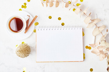 Ring in the new year with a steaming cup of coffee, vibrant confetti, and mock-up resolutions.