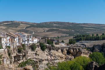 Fototapeta na wymiar View of the houses on the cliffs of Alhama de Granada (Spain), also known for its hot springs