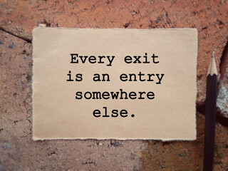 Motivational and inspirational wording. Every Exit Is An Entry Somewhere Else. With blurred style...
