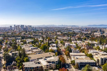 Fotobehang Aerial images over housing and apartment communities in Oakland, California © Rich