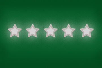 Gray, silver five star shape on a green background. The best excellent business services rating...