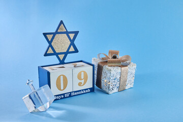 Hanukkah Countdown Calendar. Hanukkah Calendar with David star and dreidel.