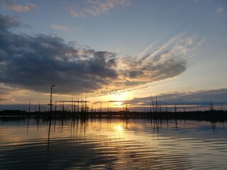 Fototapeta na wymiar A beautiful sunset over looking the Louisiana bayou.