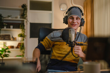 man shooting or streaming video podcast or vlogg blogger at studio