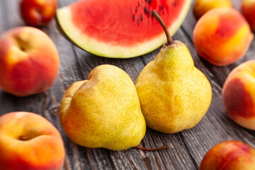 yellow pear on wood background
