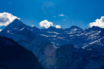 Mountain landscape with majestic peaks, lush greenery. Nature photography. Scenic, outdoors, adventure, travel, hiking, wilderness, exploration. Alps, Tyrol and Austria.