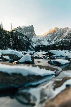 Beautiful Snowy Trees And Mountains In The Winter During Sunset