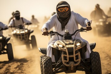 Arab men ride buggies in the desert near Dubai