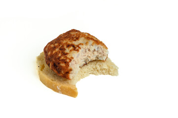 cutlet on a piece of bread, bitten off 2