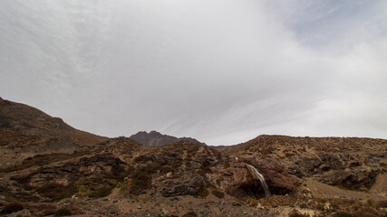 landscape with clouds and waterfall  Cajón del Maipo e Embalse El Yeso, Chile , Santiago, Chile