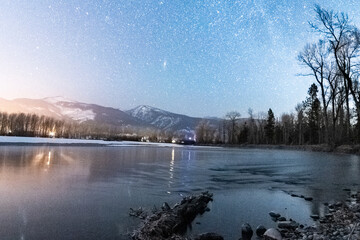 Wintry River Flowing Towards the Stars
