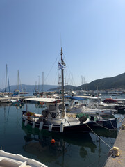 Fisherman's boat in the morning at sunset. Ithaca Greece