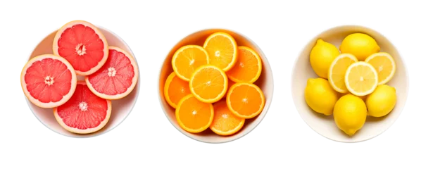 Foto op Plexiglas Top view of citrus fruit, grapefruit, orange and lemon slices in bowls over white transparent background © Pajaros Volando