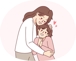 Happy mother hugging small daughter