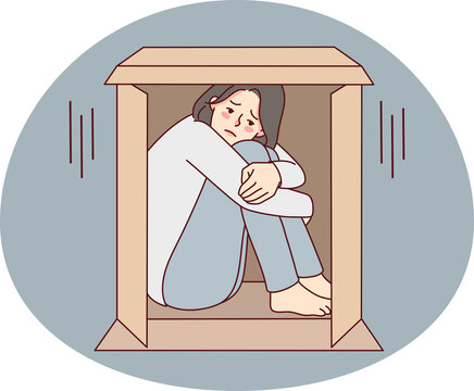 Unhappy woman hide in box