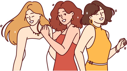 Three dancing women in evening dresses participate in birthday party or dance festival