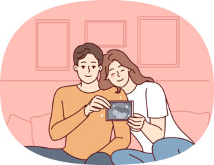 Smiling couple showing baby ultrasound