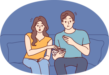 Couple relaxing at home watching movie